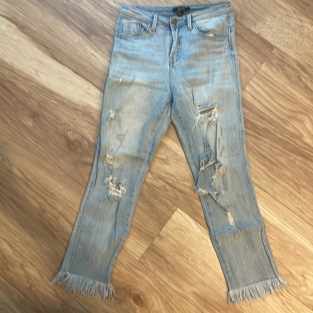High waisted distressed jeans